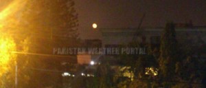 Orange Moon over the skies of Karachi